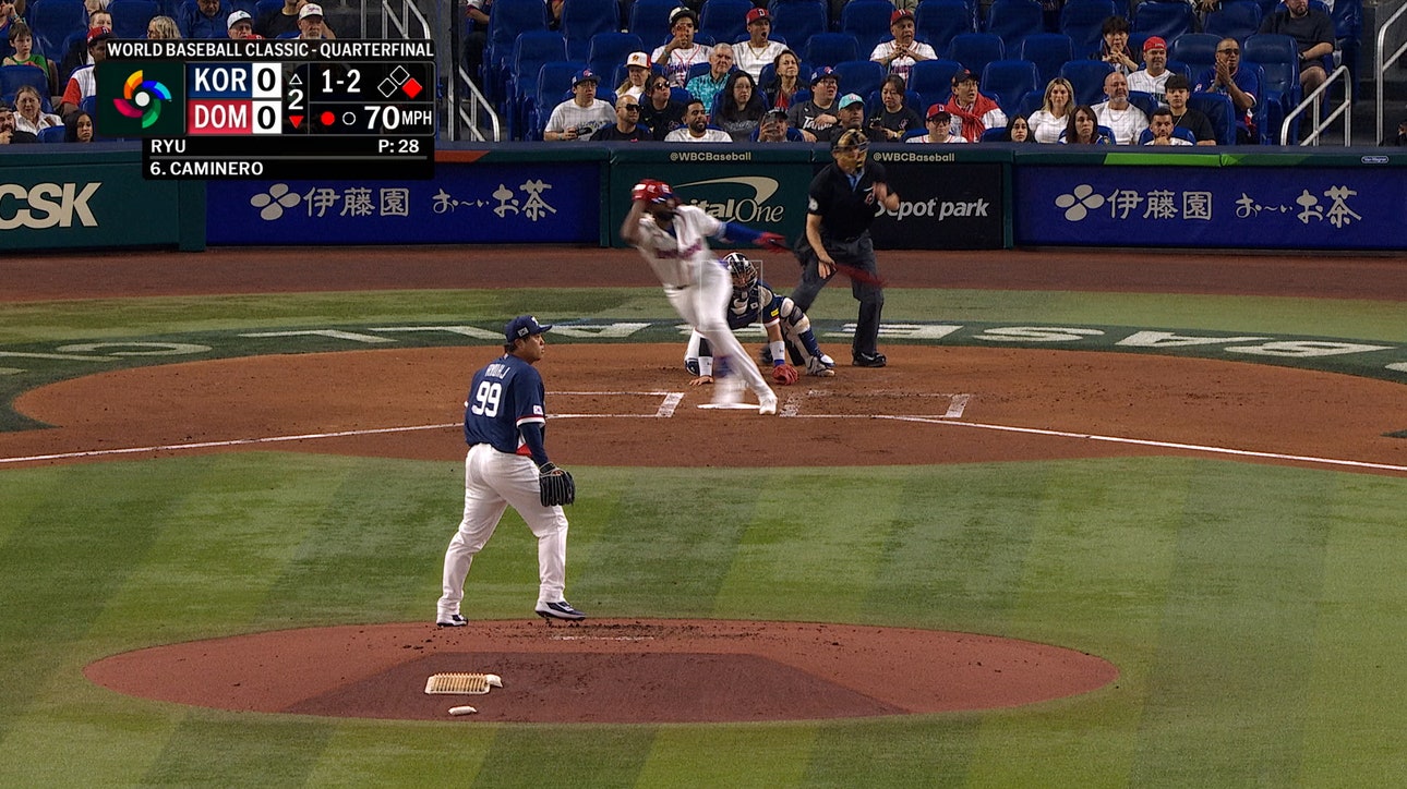  Dominican Republic's Junior Caminero doubles, scoring run for early lead over Korea