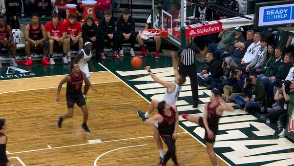 Michigan State's Carson Cooper HAMMERS alley oop for the and-one vs. Cornell 