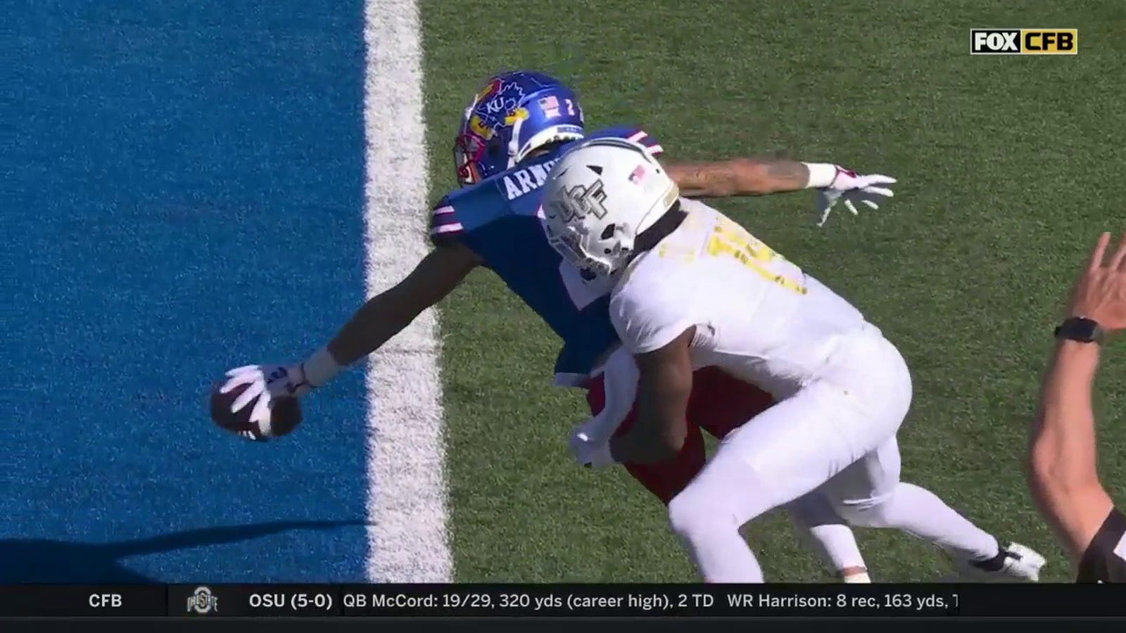 Kansas' Jason Bean connects with Lawrence Arnold for a five-yard TD