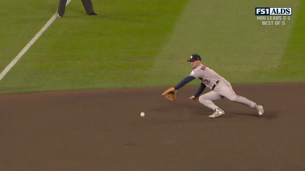 Astros' Alex Bregman makes a lightning fast grab to secure the out at first  vs. Twins