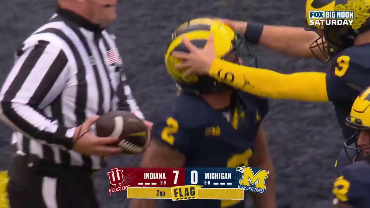 Michigan's Blake Corum punches in the touchdown to tie the game vs. Indiana