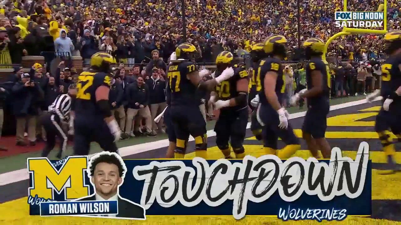Michigan's J.J. McCarthy connects with Roman Wilson for a touchdown to take the lead against Indiana