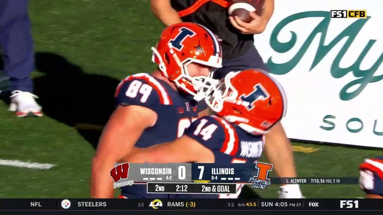 Luke Altmyer connects with Tip Reiman for a three-yard TD to extend Illinois' lead vs. Wisconsin