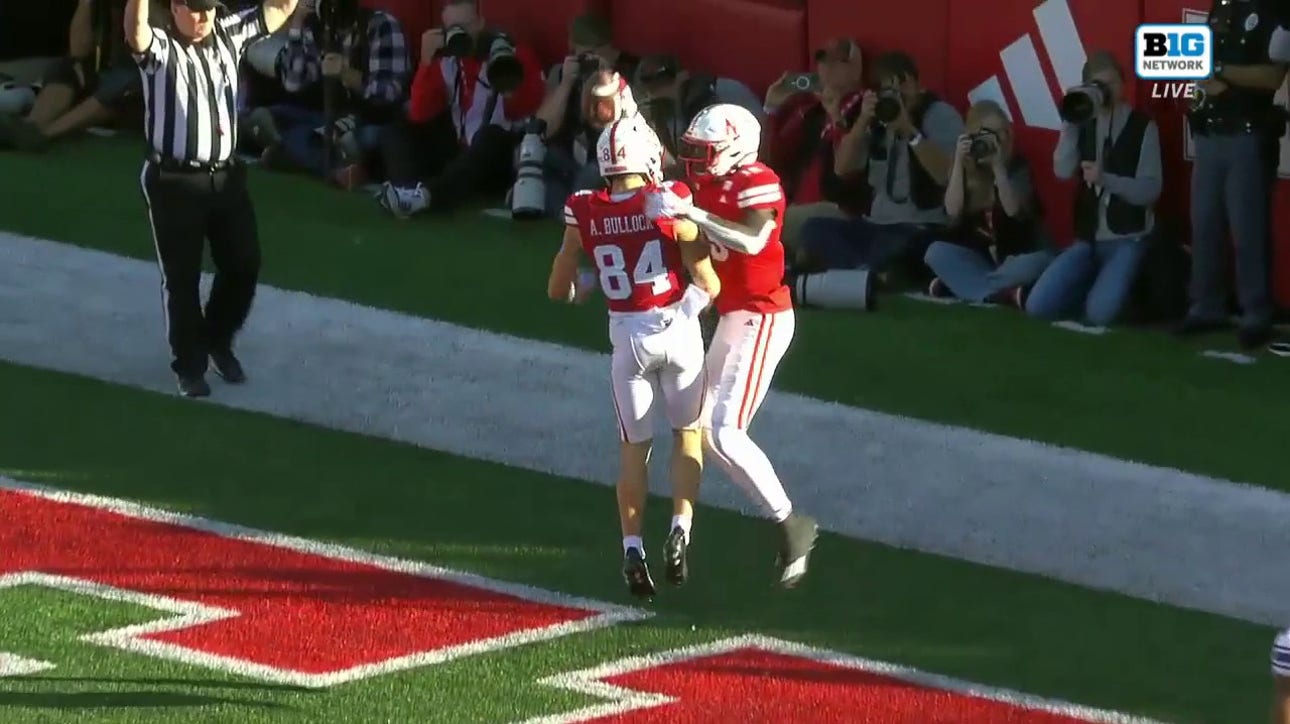 Nebraska's Heinrich Haarberg connects with Malachi Coleman on a 44-yard touchdown to take a 17-6 lead over Northwestern