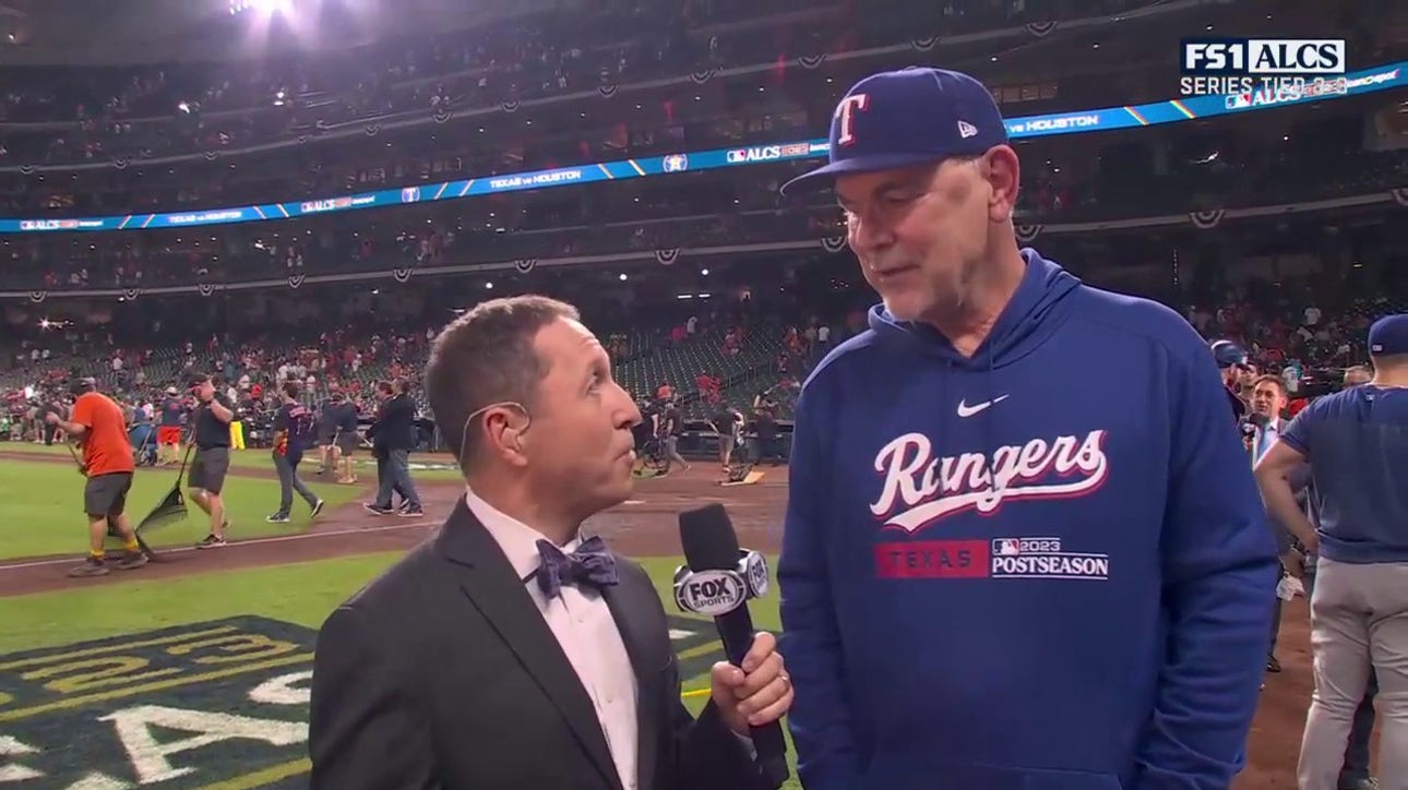 Ken Rosenthal speaks with Bruce Bochy after Rangers' victory over Astros to force Game 7