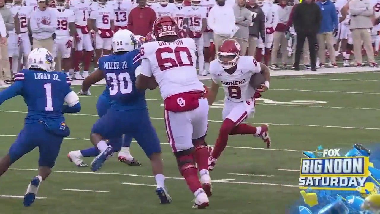 Oklahoma's Dillon Gabriel rushes for a seven-yard TD to cut into Kansas' early lead