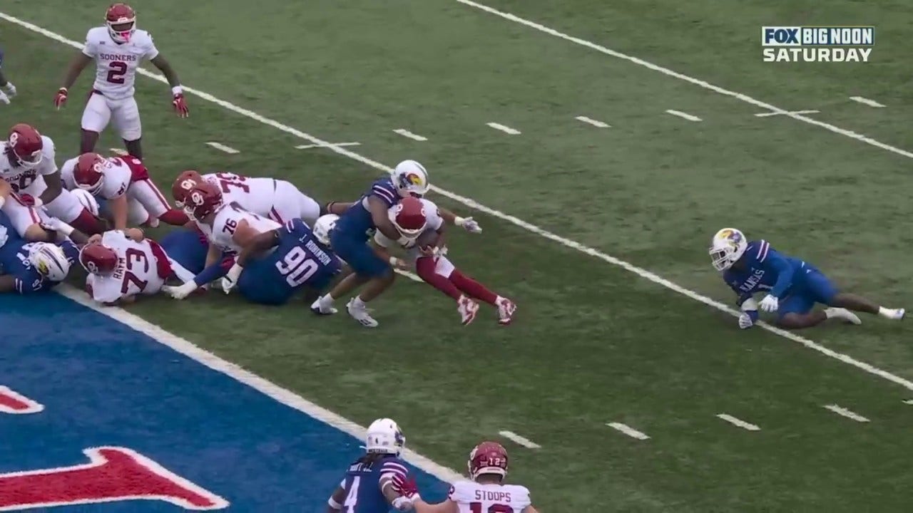 Dillon Gabriel capitalizes on an interception by the Oklahoma defense to score his third rushing touchdown against Kansas