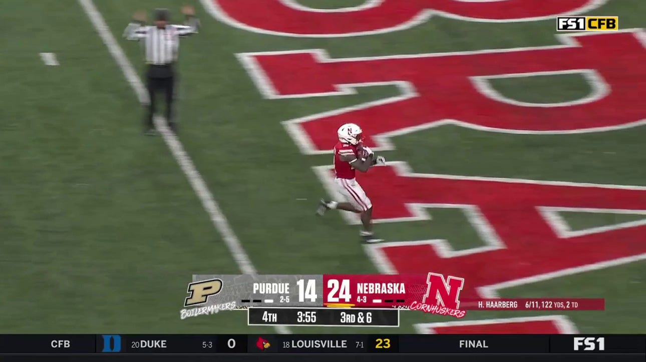 Emmett Johnson puts on the jets for a 28-yard touchdown to put a bow on Nebraska's 31-14 win over Purdue