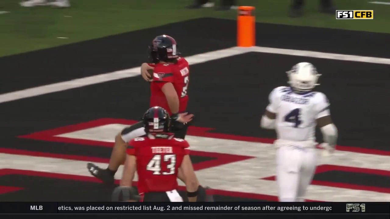 Behren Morton scrambles for a nine-yard TD to give Texas Tech an early lead vs. TCU