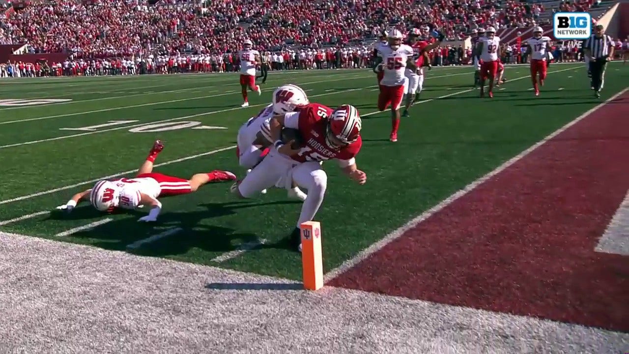 Brendan Sorsby rushes for an eight-yard touchdown to give Indiana an early lead over Wisconsin