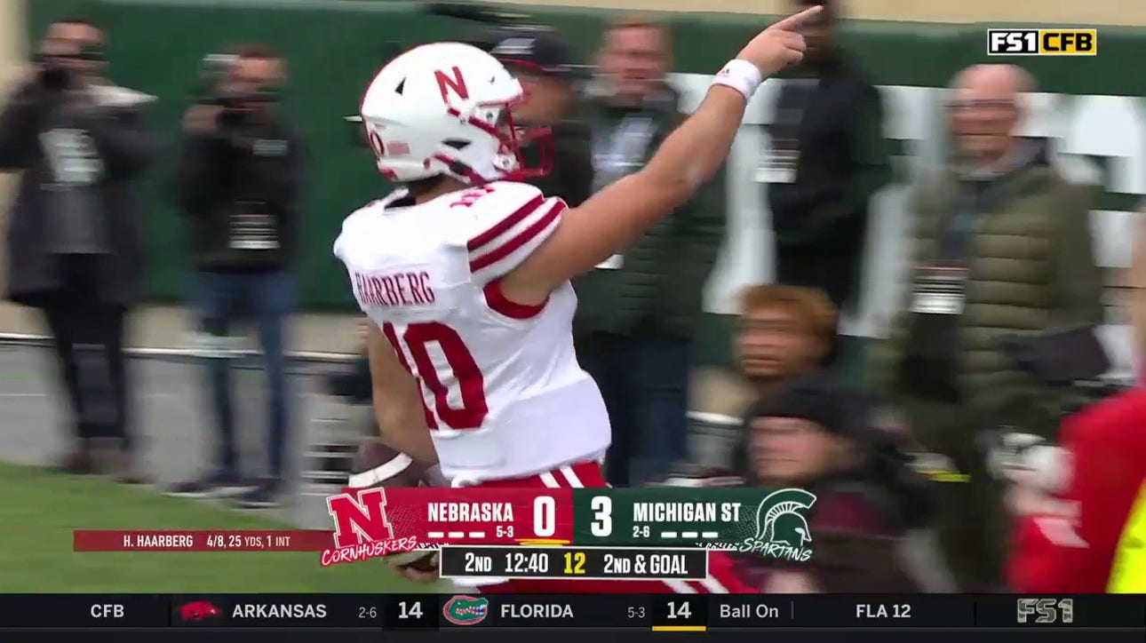 Heinrich Haarberg rushes for a five yard TD to give Nebraska the lead vs. Michigan State