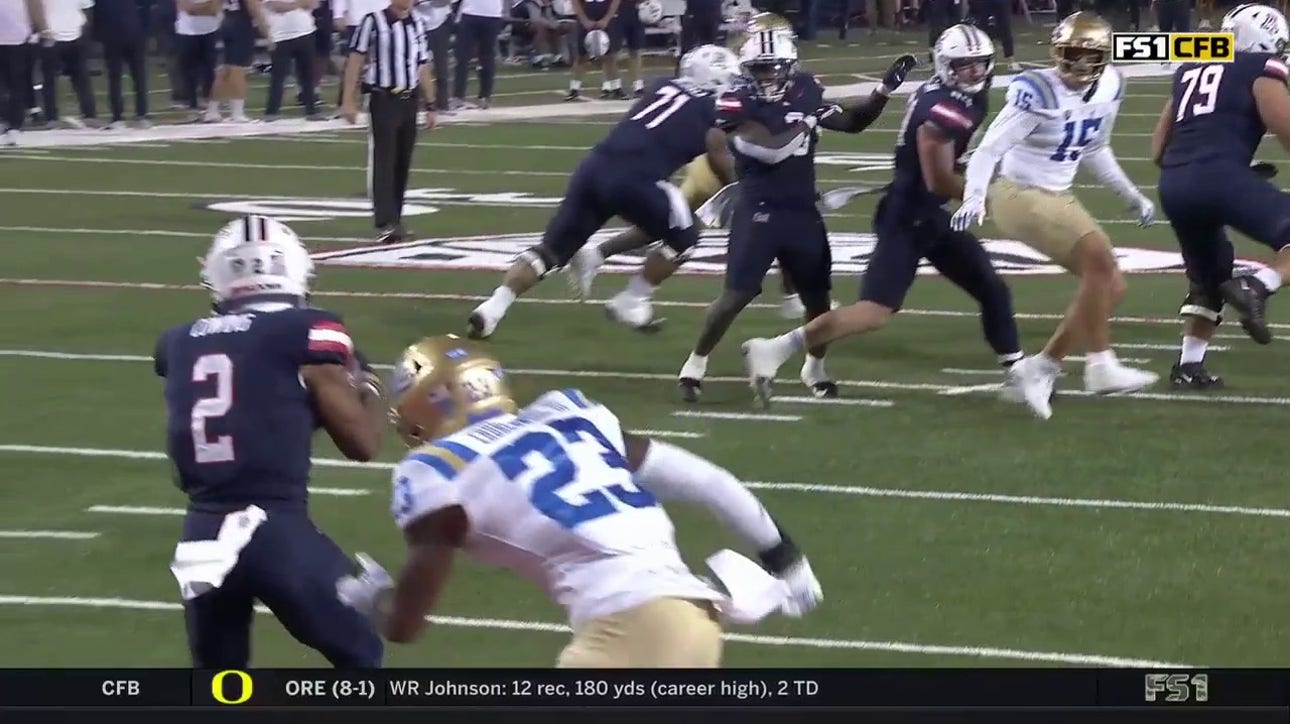 Arizona's Noah Fifita throws a nine-yard touchdown dot to Jacob Cowing to increase the lead over UCLA