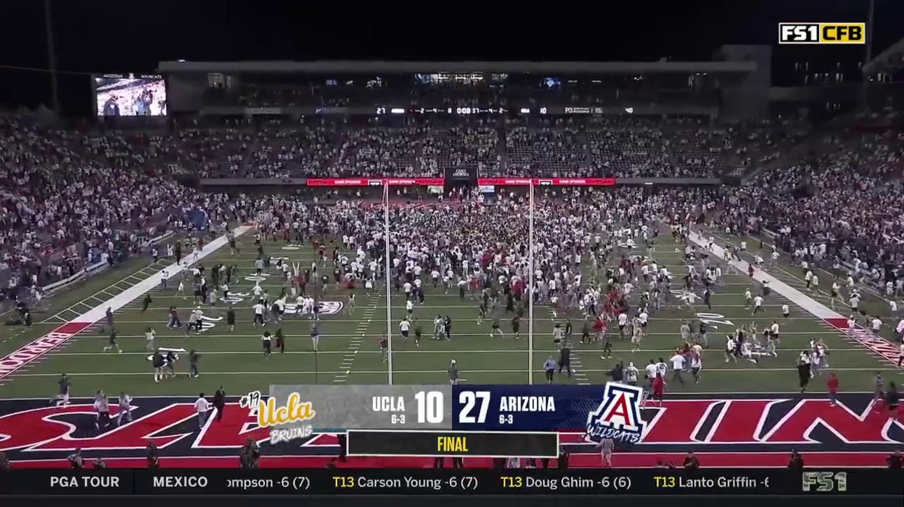 Arizona fans rush Arizona Stadium field after upset win against No. 19 UCLA