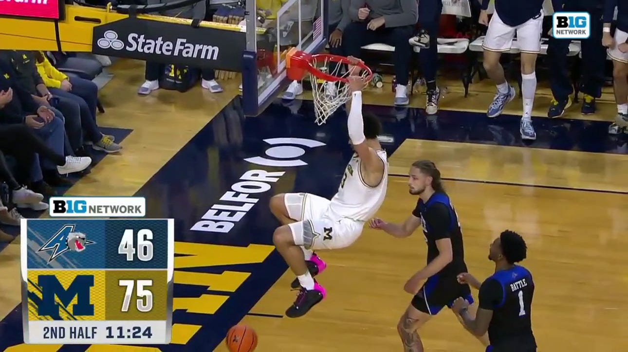 Michigan's Olivier Nkamhoua delivers his FIFTH dunk of the night vs. UNC Asheville