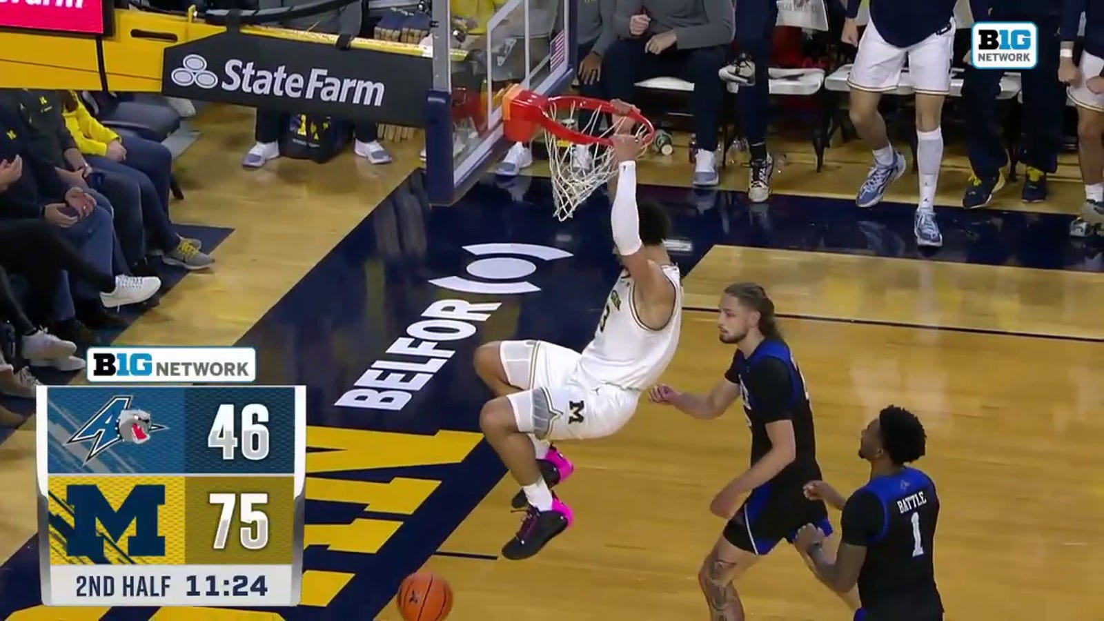 Michigan's Olivier Nkamhoua delivers his FIFTH dunk of the night vs. UNC Asheville