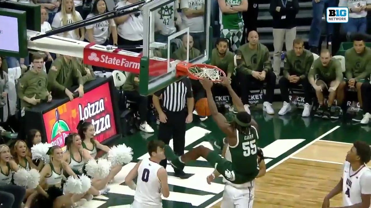 Coen Carr cuts baseline for the ferocious jam, extending Michigan State's lead over Southern Indiana