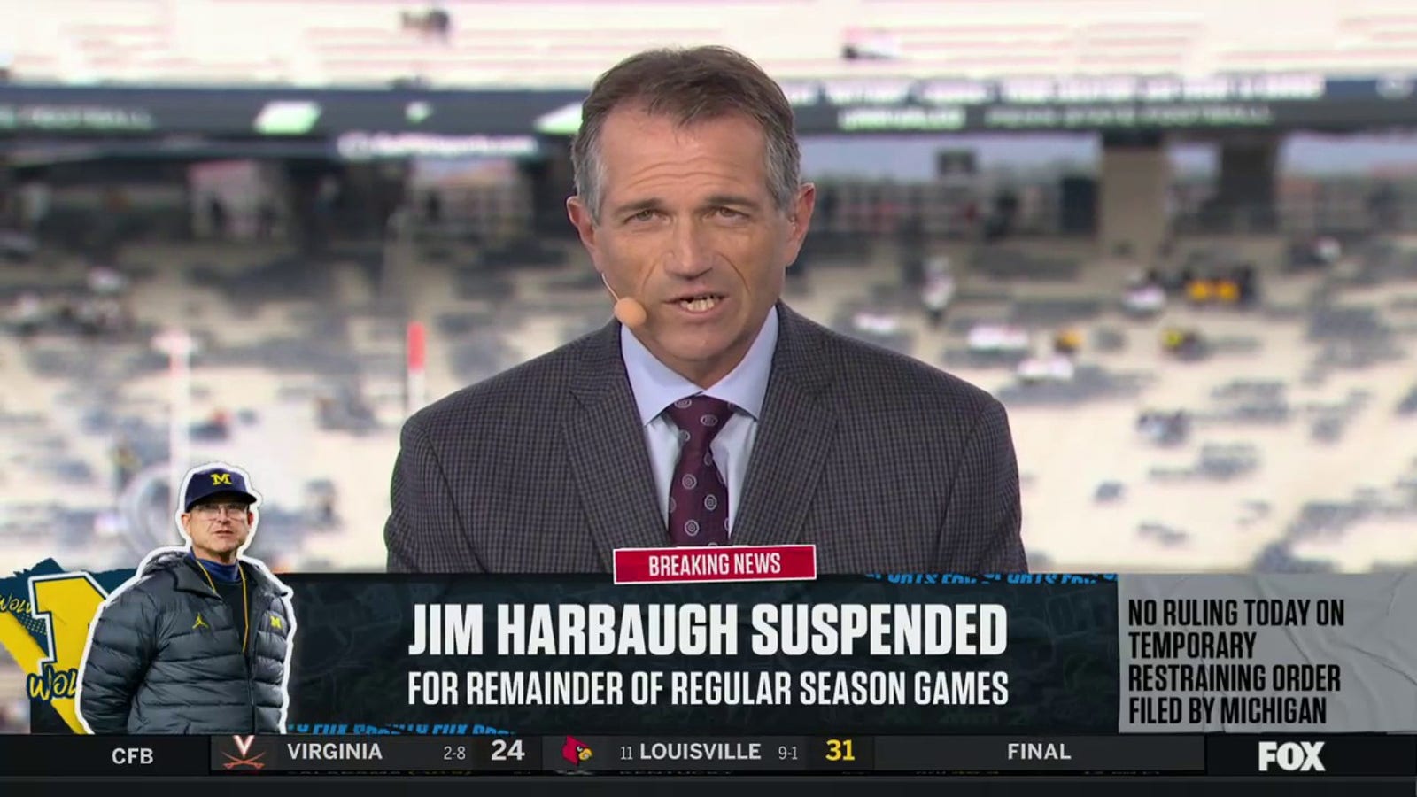 Michigan's Jim Harbaugh won't appear vs. Penn State