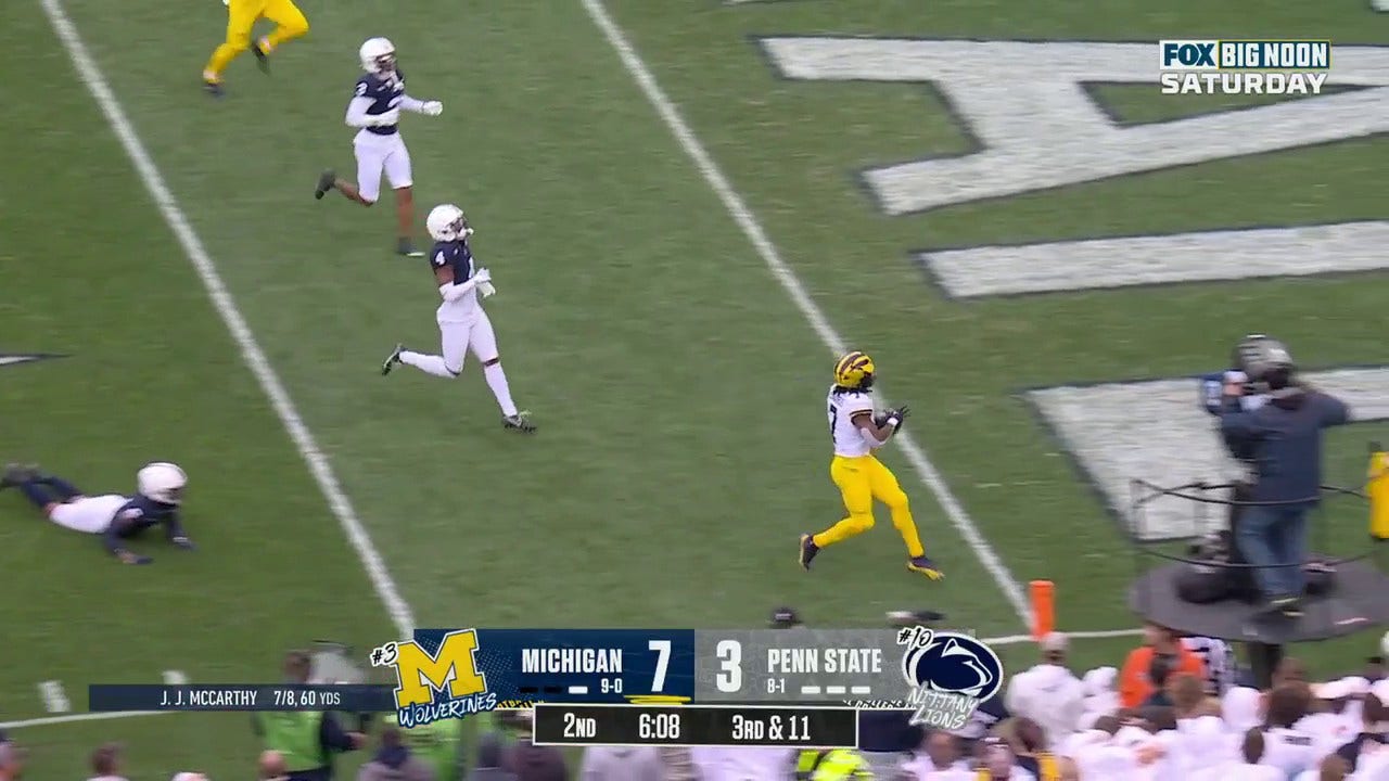 Michigan's Donovan Edwards breaks off a 22-yard touchdown rush to increase Wolverines' lead over Penn State