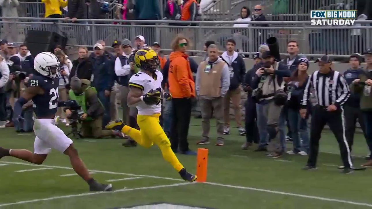 Michigan's Blake Corum rushes for a 30-yard touchdown to increase Wolverines' lead over Penn State