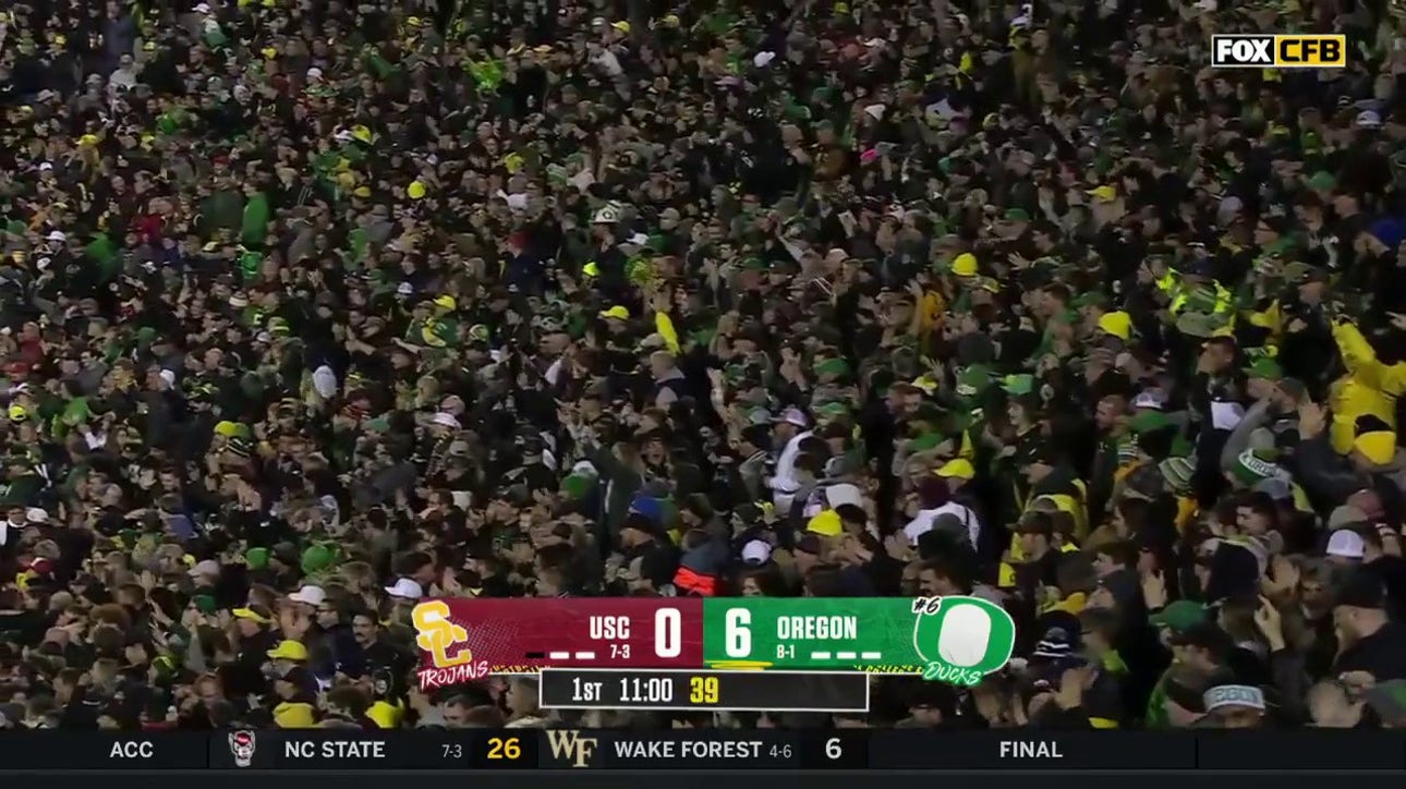 Bo Nix connects with Tez Johnson for a 77-yard TD to give Oregon the lead vs. USC