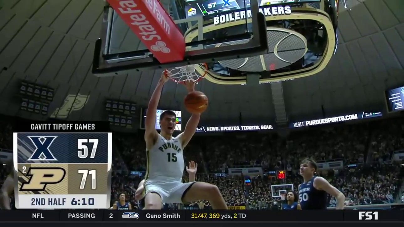 Purdue's Zach Edey brings down a MONSTER two-hand dunk to take a 68-57 lead over Xavier