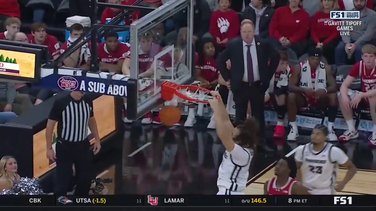 Josh Oduro throws down a ferocious two-hand dunk to extend Providence's lead over Wisconsin