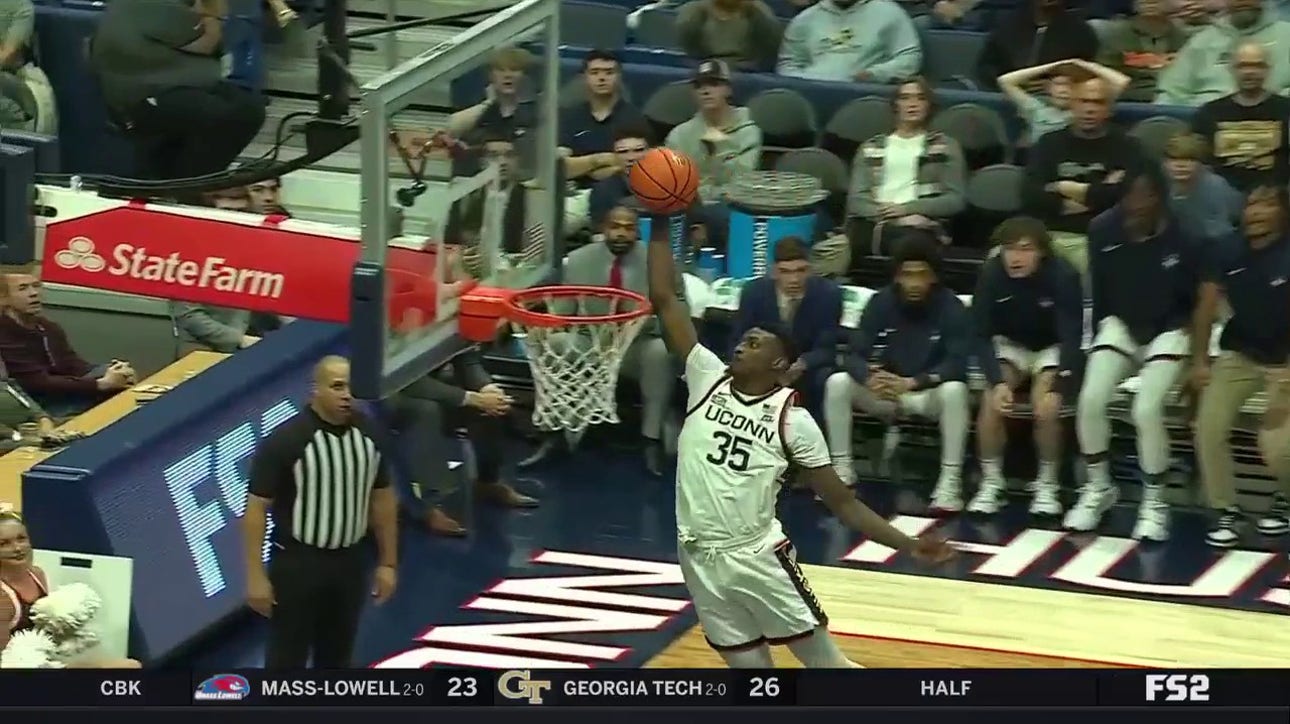 Samson Johnson slams an Alley-Oop dunk from Cam Spencer to extend UConn's lead over MS Valley