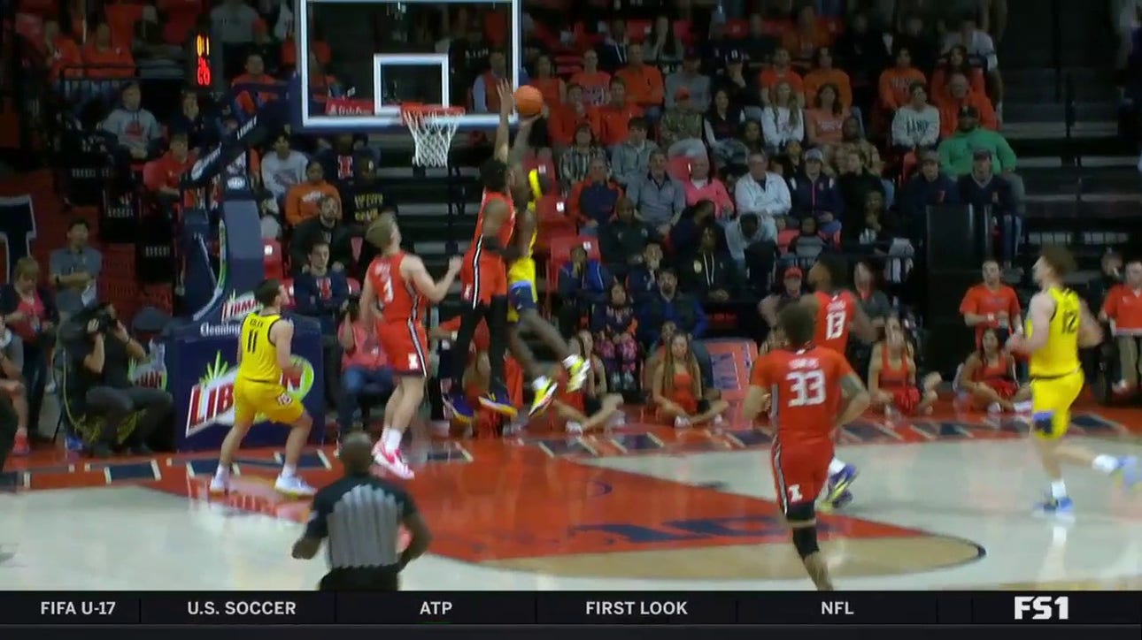 Illinois' Terrence Shannon pulls off a strong chase-down block against Marquette in transition