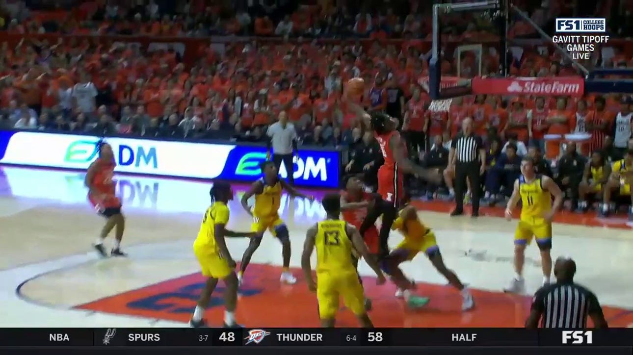 Illinois' Terrence Shannon throws down a NASTY one-hand dunk to even the score against Marquette