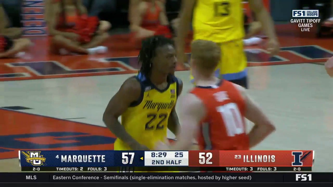 Sean Jones buries a three to extend Marquette's lead vs. Illinois