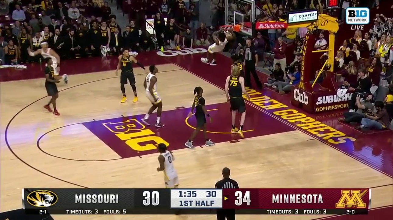 Minnesota's Joshua Ola-Joseph cuts baseline for the two-handed jam vs. Missouri
