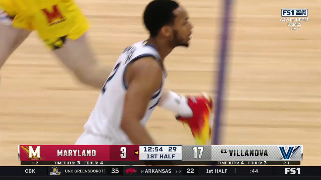 Mark Armstrong finishes a layup after a shifty spin move to extend Villanova's lead