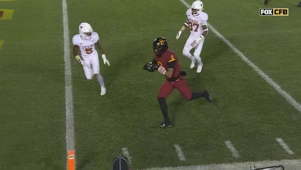 Iowa State's Eli Sanders runs past Texas' defense on 14-yard TD reception to trim deficit