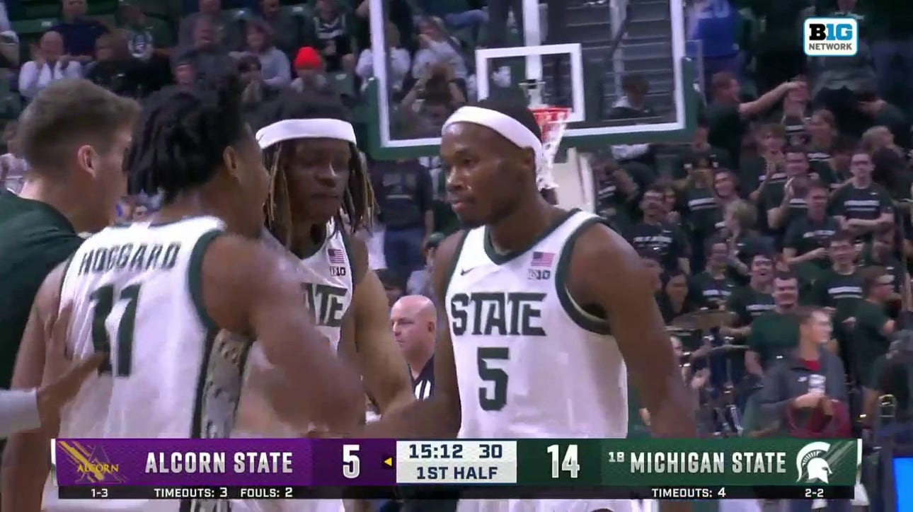 Tre Holloman drills the transition 3-pointer, extending Michigan State's lead over Alcorn State