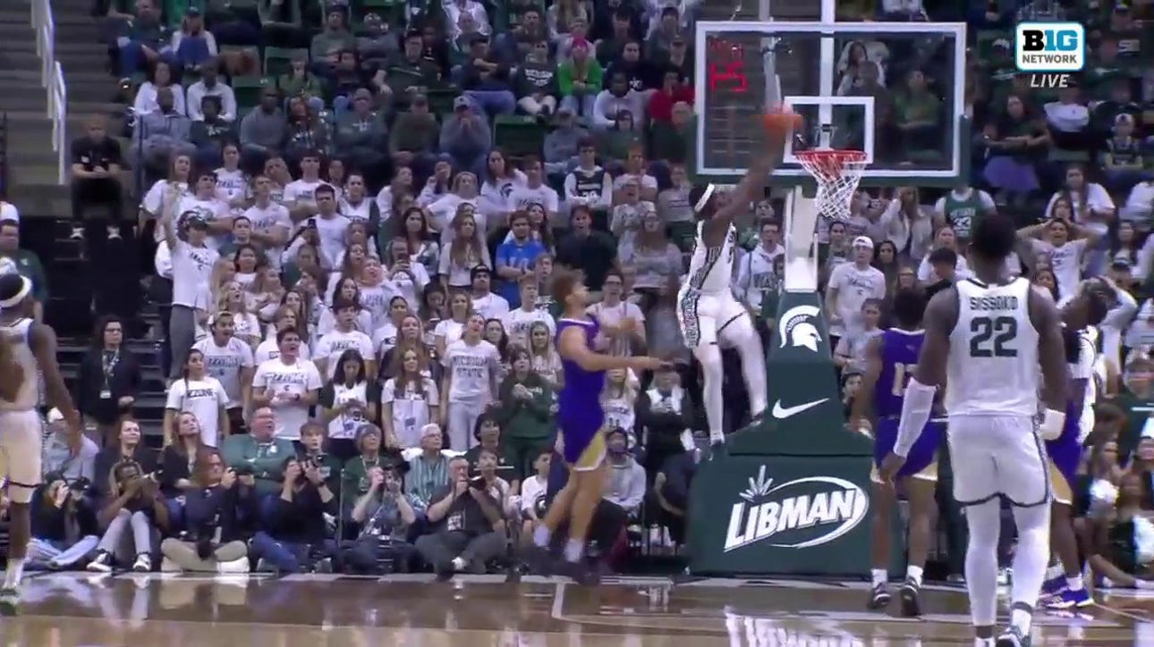 Michigan State's Tre Holloman finds Coen Carr for a strong two-handed dunk against Alcorn State