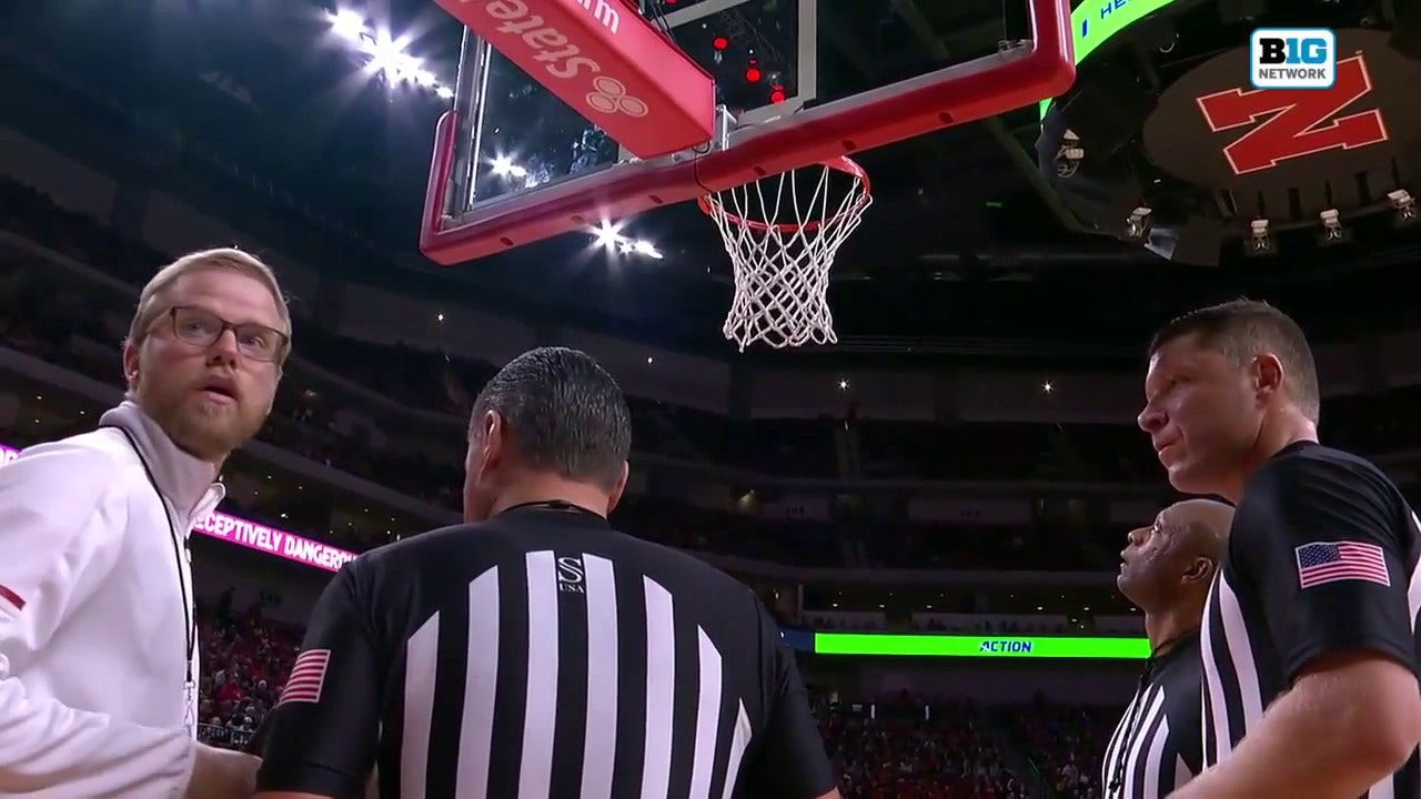 The Nebraska vs. Duquesne game comes to a stop after a BOLT falls off of the backboard