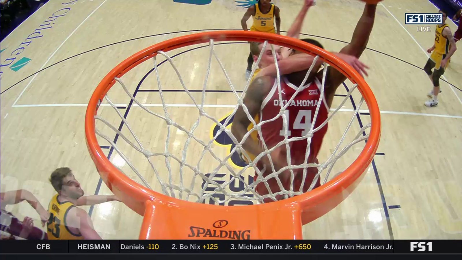 Jalon Moore takes off for one-handed, and-1 slam to extend Oklahoma's lead