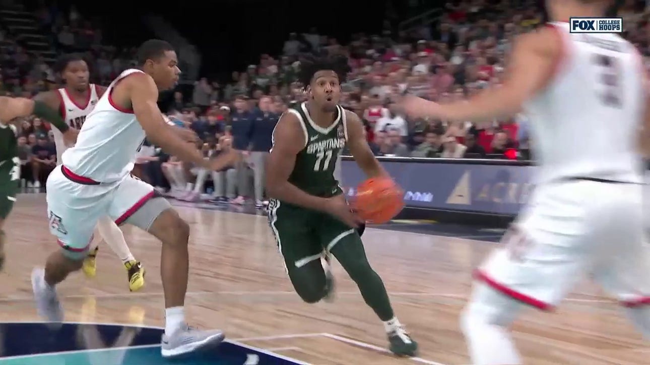 A.J. Hoggard sinks the layup to give Michigan State the lead against Arizona