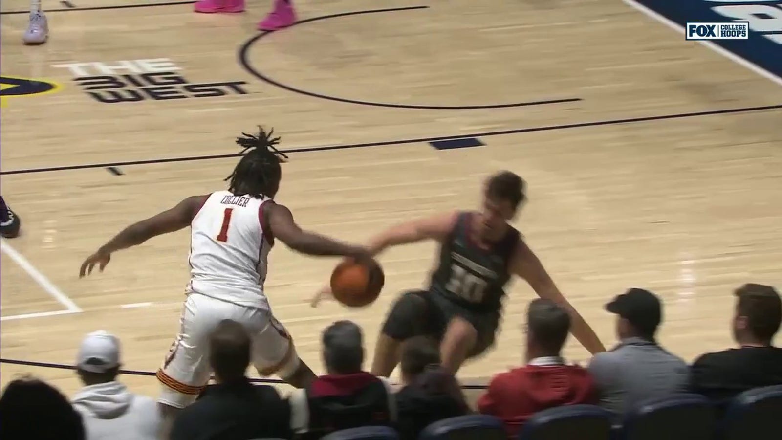 USC's Isaiah Collier breaks an Oklahoma defender's ankles and hits the 3-pointer