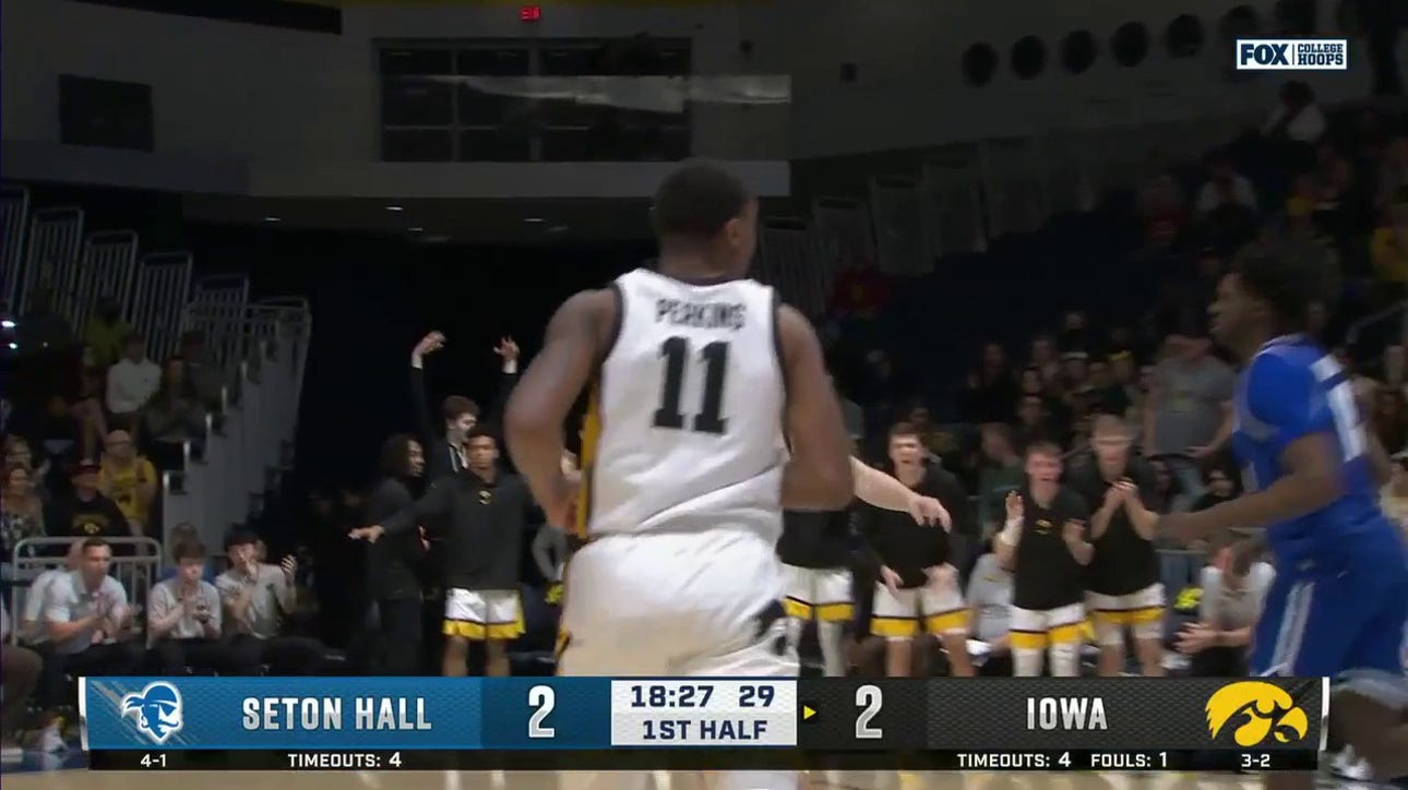 Iowa's Tony Perkins delivers a vicious one-handed jam against Seton Hall