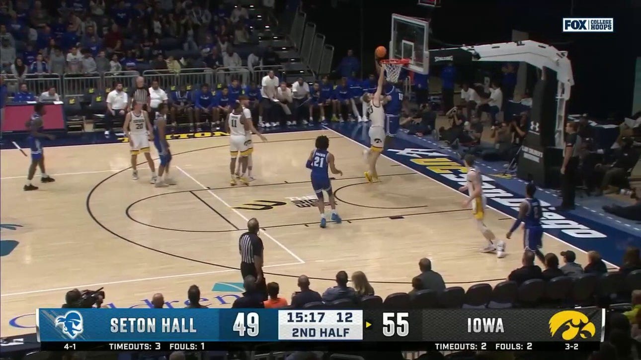 Seton Hall's Jaden Bediako throws down a powerful one-handed dunk against Iowa