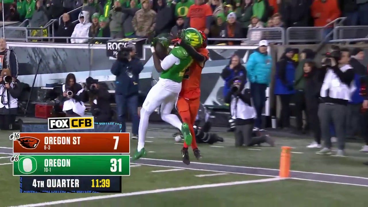 Oregon's Dontae Manning makes a clutch interception in the endzone off DJ Uiagalelei