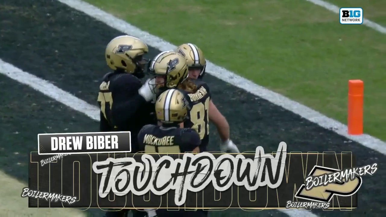 Purdue's Drew Biber catches a 16-yard touchdown from Hudson Card to shrink Indiana's lead before halftime