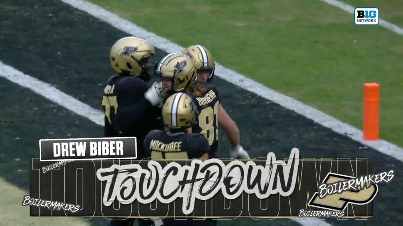 Purdue's Drew Biber catches a 16-yard touchdown from Hudson Card to shrink Indiana's lead before halftime