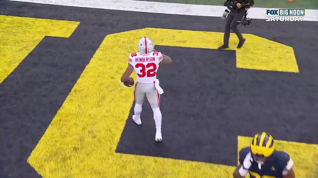 Ohio State's  TreVeyon Henderson punches in a three-yard TD to tie the game against Michigan