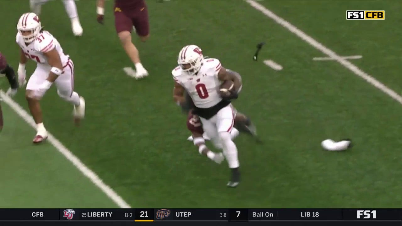 Braelon Allen rushes in a five yard touchdown as Wisconsin ties up the game vs. Minnesota