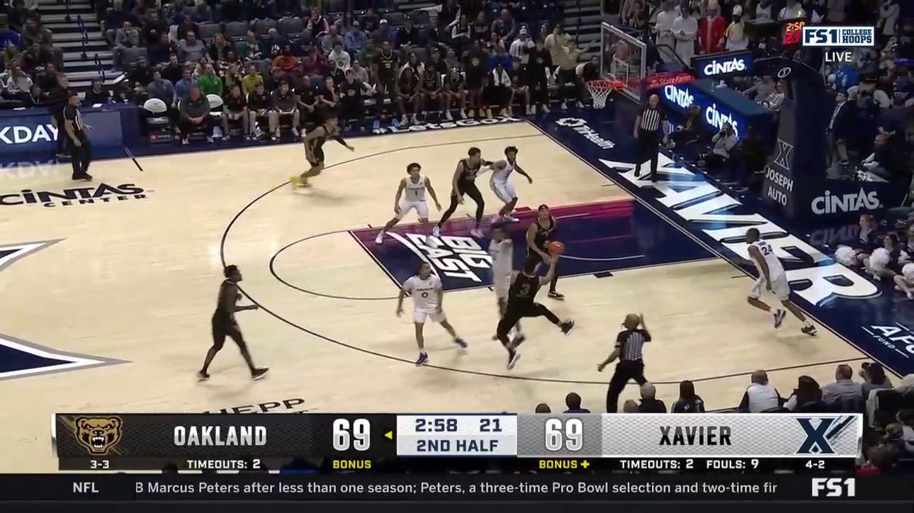 Jack Gohlke makes a contested three-pointer to give Oakland a lead late vs. Xavier