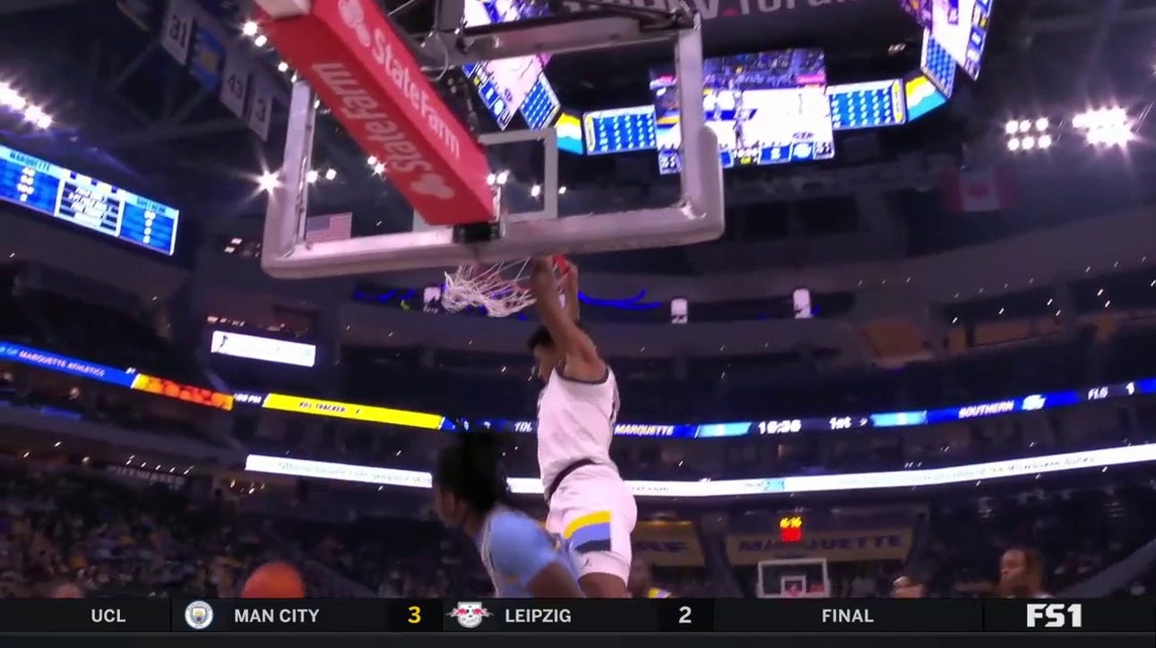 Stevie Mitchell finds Oso Ighodaro for an Alley-Oop dunk, to extend Marquette's lead over Southern U 