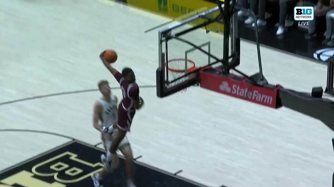 Texas Southern's Zytarious Mortle makes the steal and delivers a VICIOUS windmill jam against Purdue