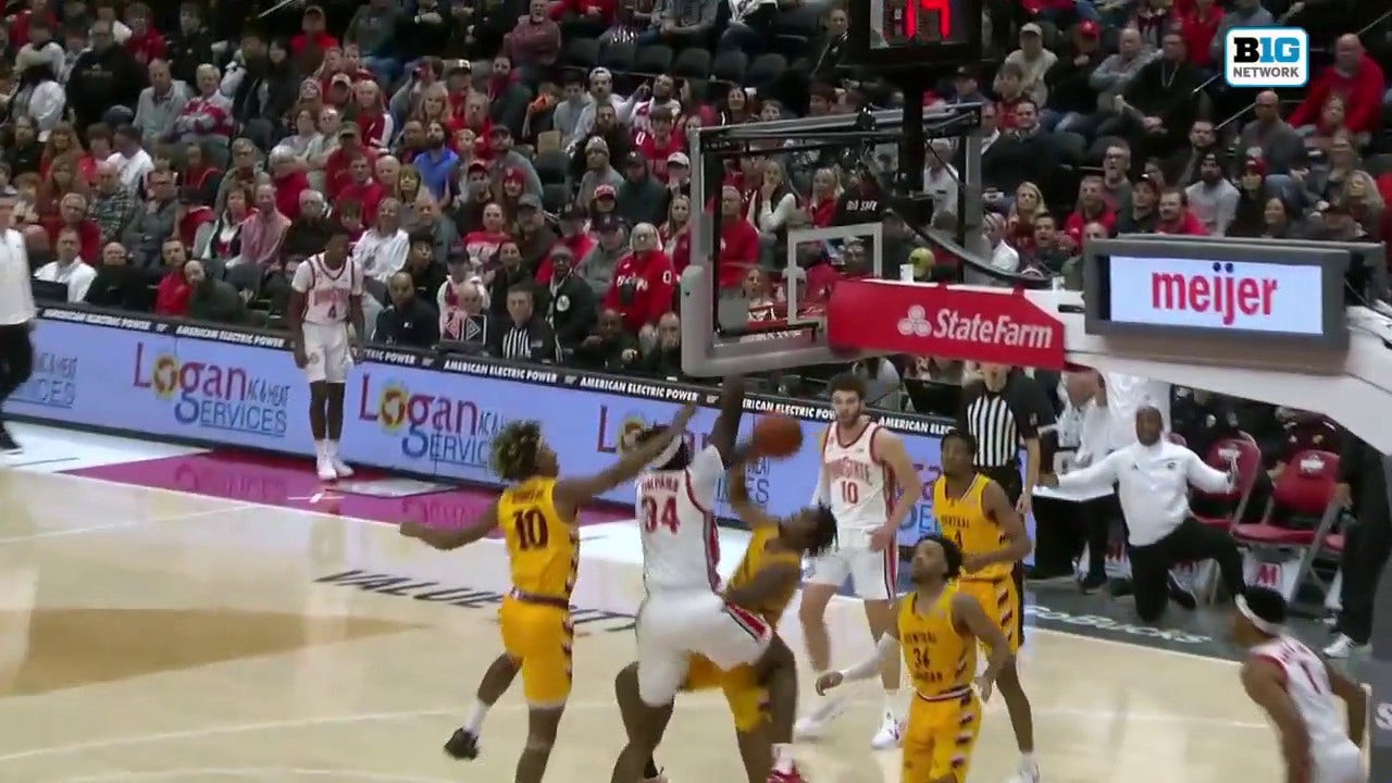 Felix Okpara goes up for the strong one-handed slam to give Ohio State a 22-20 lead over Central Michigan